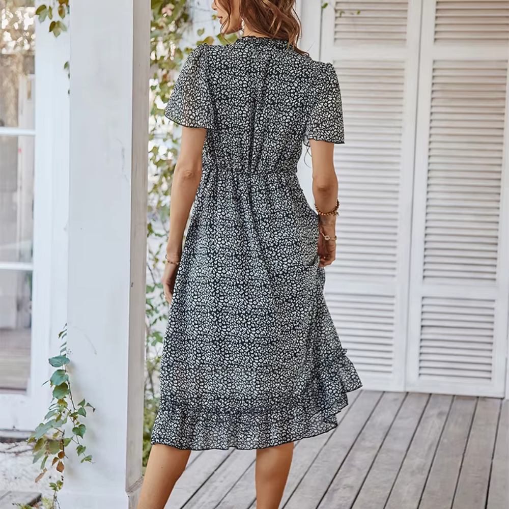 Lexi - Robe maxi boho avec motif floral & manches volantes